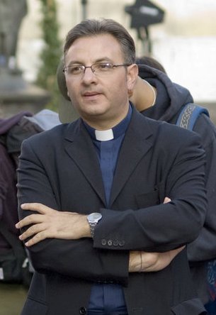 Padre Salvatore Alì, sacerdote reggente della parrocchia "Spirito Santo" a Paternò, editorialista di Freedom24