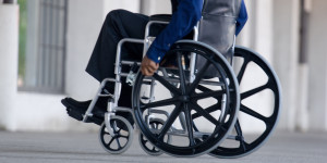 Side view of man in wheelchair